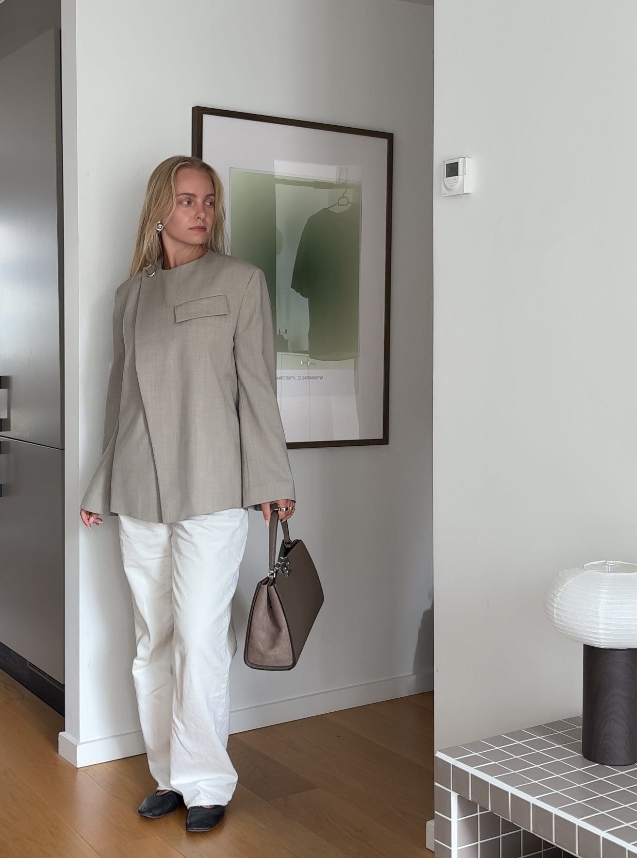 Corporate office outfit, office outfit inspo, scandi outfit inspo, cream jeans and blazer look for the office with a bag and ballerinas